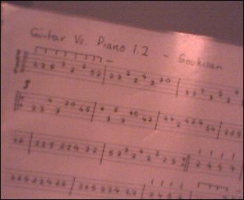 Hooray! I finshed tabbing Guitar Vs. Piano!