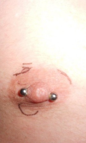 i drew a smiley face on my nipple