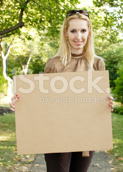 1696970_145465073683_stock-photo-4461865-woman-with-blank-cardboard-sign.jpg